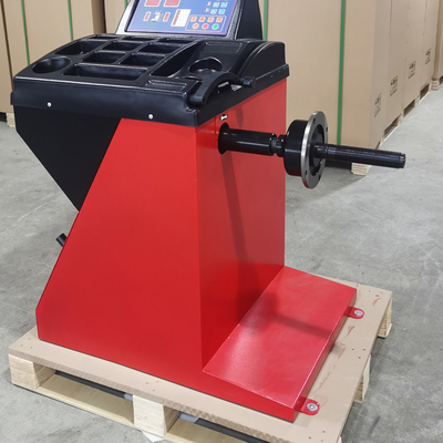 Máy cân bằng lốp xe ô tô có nón tiêu chuẩn Máy cân bằng lốp xe bọc nhựa tinh tế Máy tự hiệu chỉnh và tự chẩn đoán chương trình Thiết bị cân bằng lốp xe ô tô